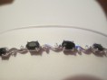 Geniune sapphire and diamond sterling silver tennis bracelet